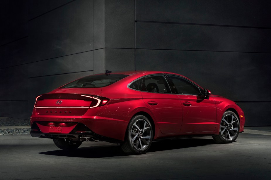 A Hyundai Sonata Hybrid Blue shows off its rear styling. 