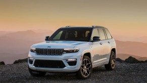 White 2023 Jeep Grand Cherokee 4xe hybrid midsize SUV