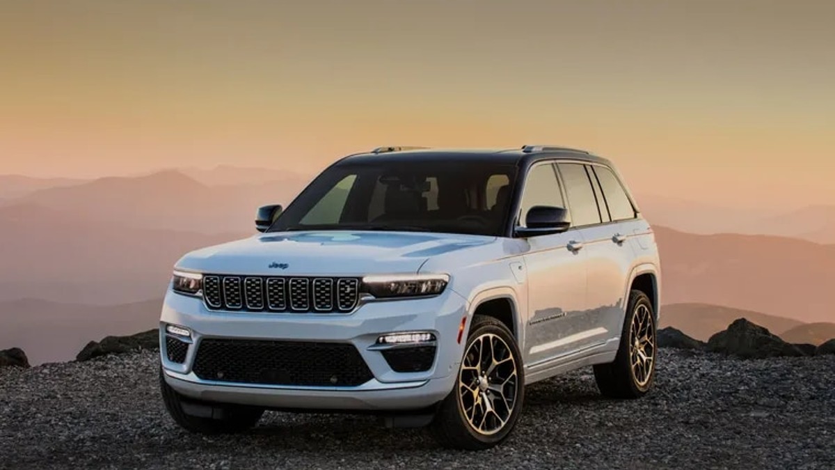 White 2023 Jeep Grand Cherokee 4xe hybrid midsize SUV