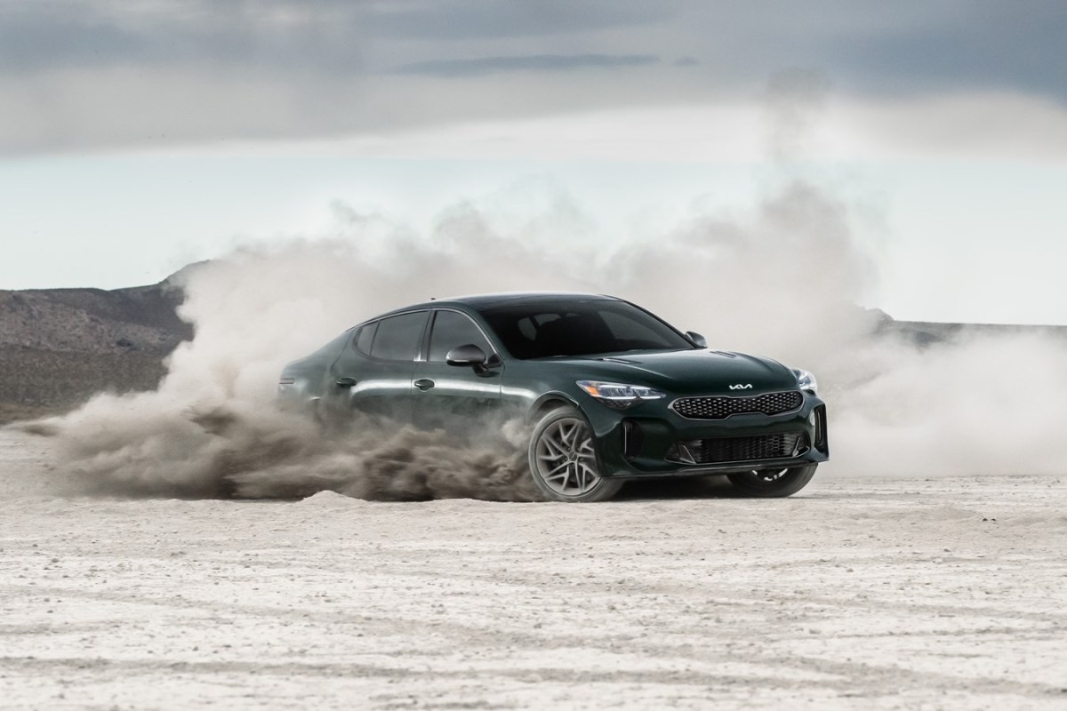 A 2023 Kia Stinger driving off-road.