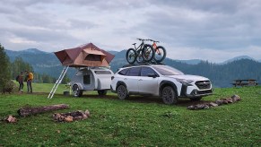 A 2023 Subaru Outback sits in a field. This is one of the best 2023 SUVs you'll love owning.