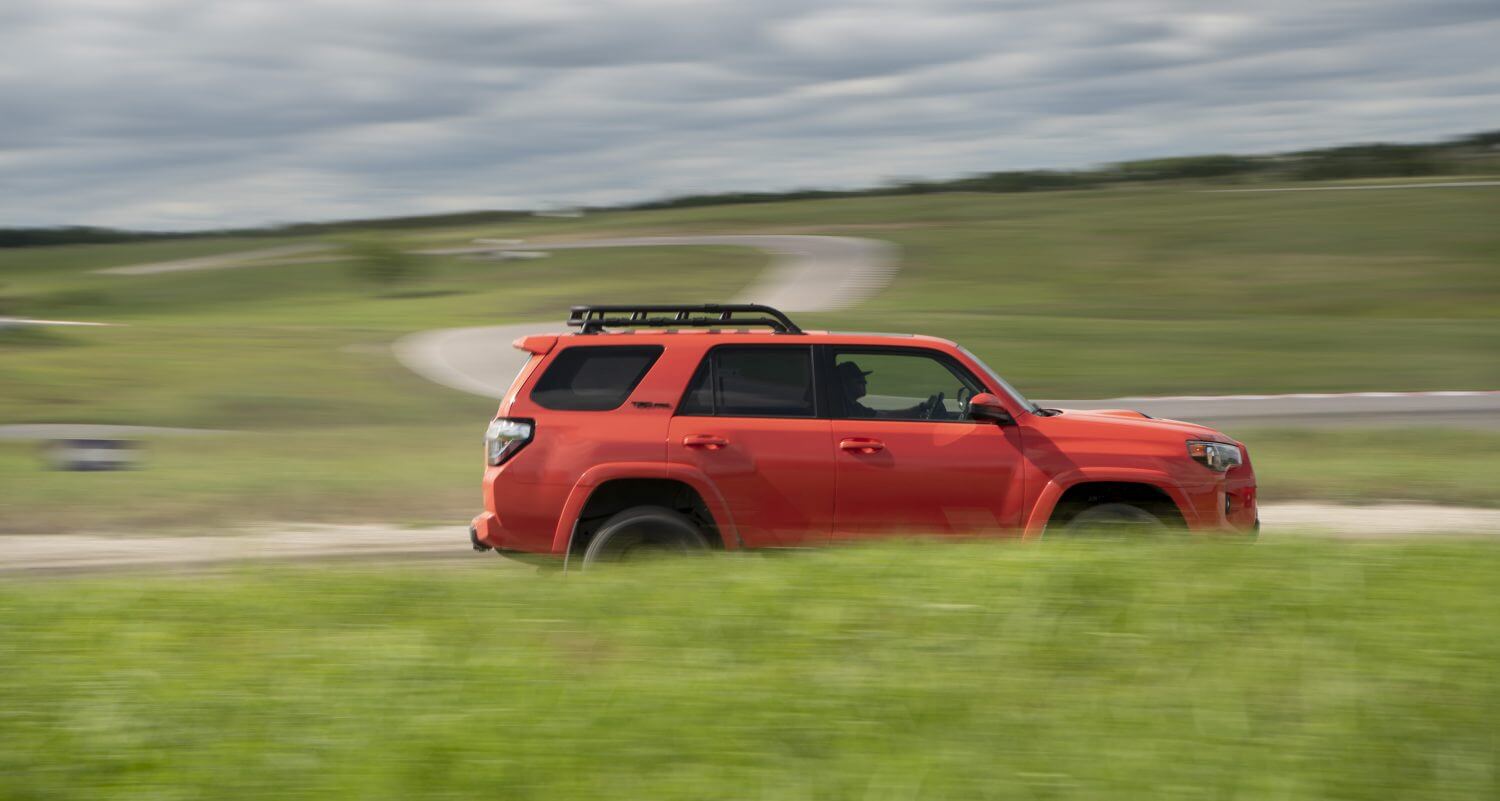 This orange 2023 Toyota 4Runner TRD Pro SUV is available with both 4WD and a 3rd row of seating, for under $50k.