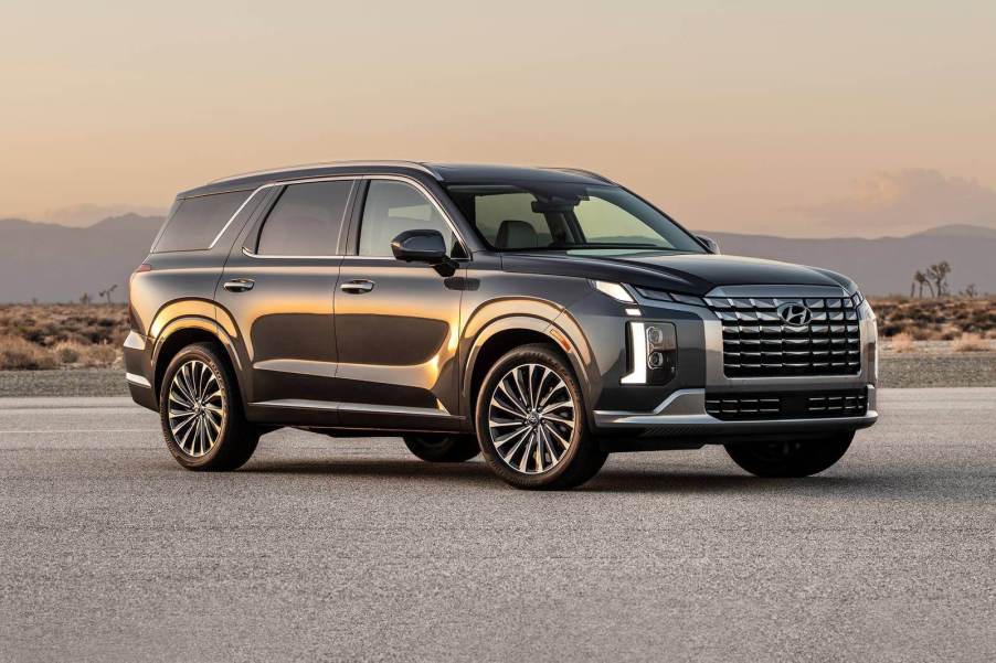 The 2023 Hyundai Palisade parked in gravel