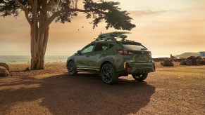 A 2024 Subaru Crosstrek carries surfboards. You can no longer get a new Crosstrek with a manual transmission.