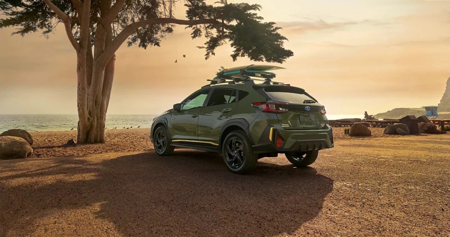 A 2024 Subaru Crosstrek carries surfboards. You can no longer get a new Crosstrek with a manual transmission.