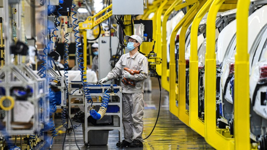 Assembly line in Xinjiang, highlighting how car parts are from forced labor in China, per New York Times