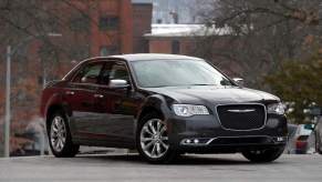 A black Chrysler 300 parked outdoors.