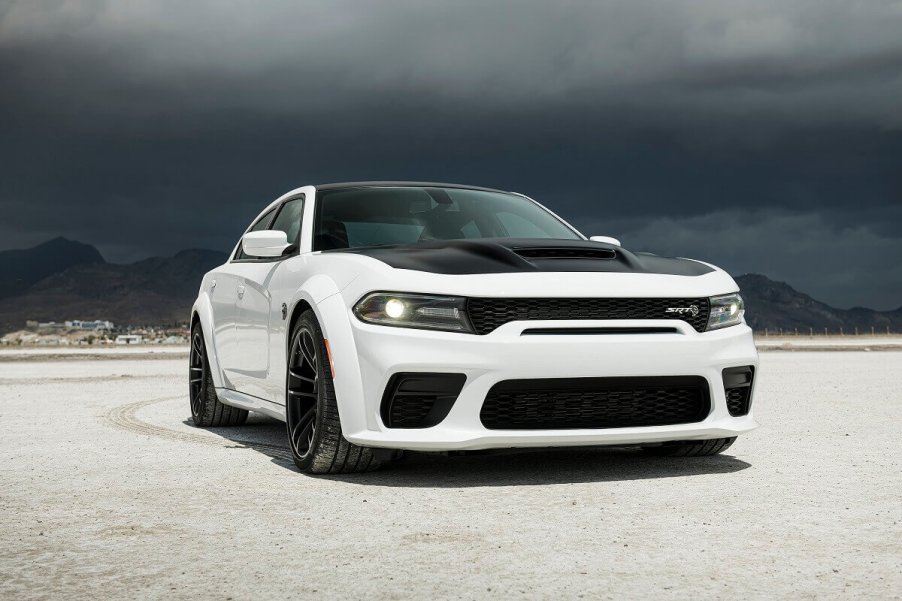 The Dodge Charger SRT Hellcat Widebody shows off its fascia which identifies it as a fast sedan with an SRT engine.