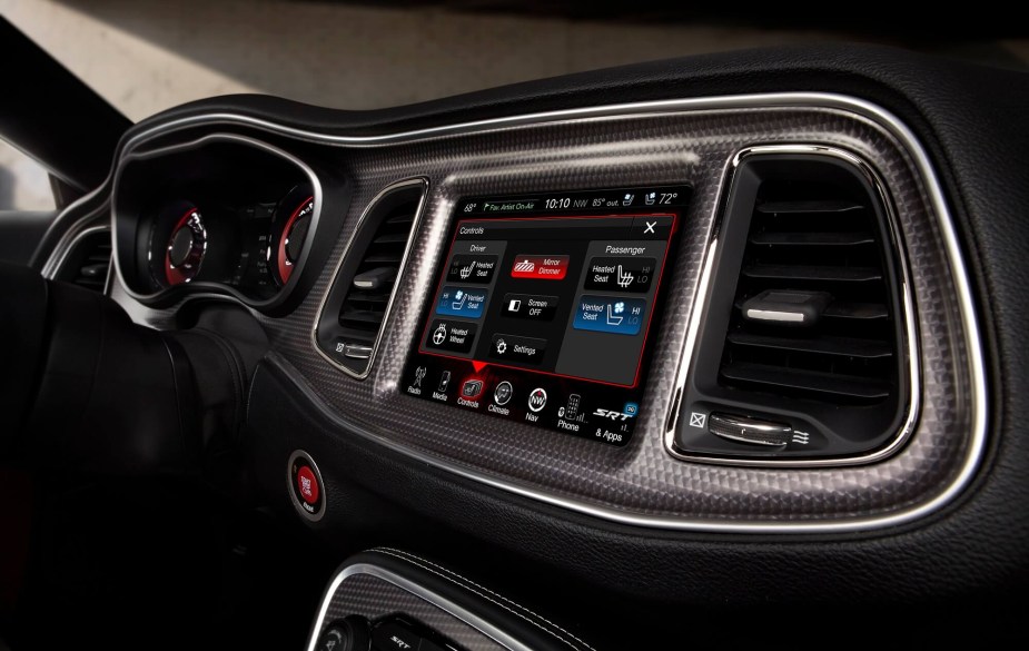 A 2023 Dodge Charger shows off its Uconnect infotainment system with a touchscreen. 