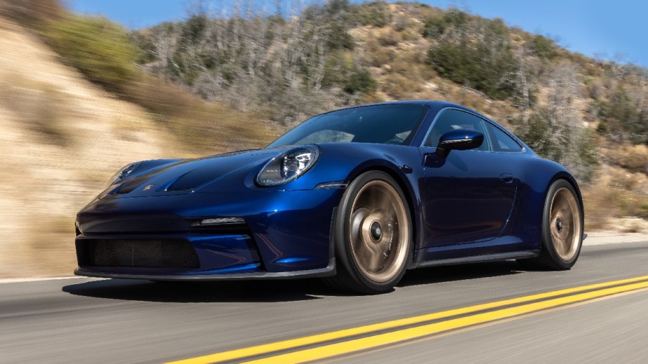 Front angle view of blue 2023 Porsche 911, highlighting the most common problems reported by owners
