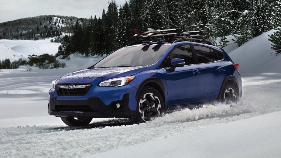 Front angle view of blue 2023 Subaru Crosstrek crossover SUV