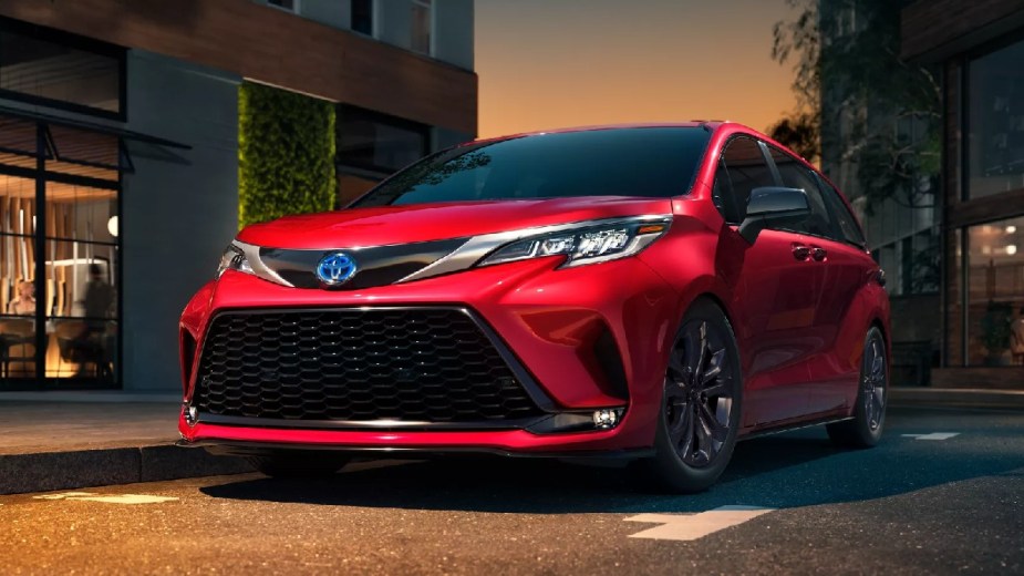 Front angle view of red 2023 Toyota Sienna minivan