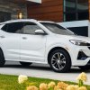 Front angle view of white 2023 Buick Encore GX, the cheapest new luxury SUV