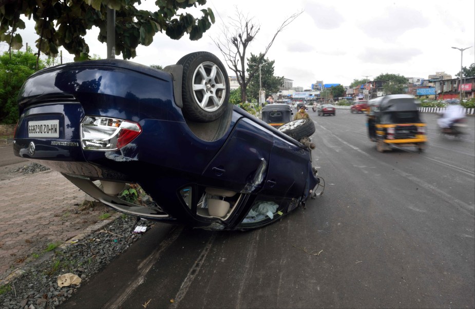 A flipped car where everyone pays the price for car accidents according to new study. 