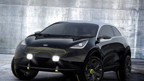 A black Kia Niro, which has the cheapest insurance costs.