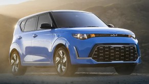 A blue 2023 Kia Soul subcompact SUV is parked outdoors.