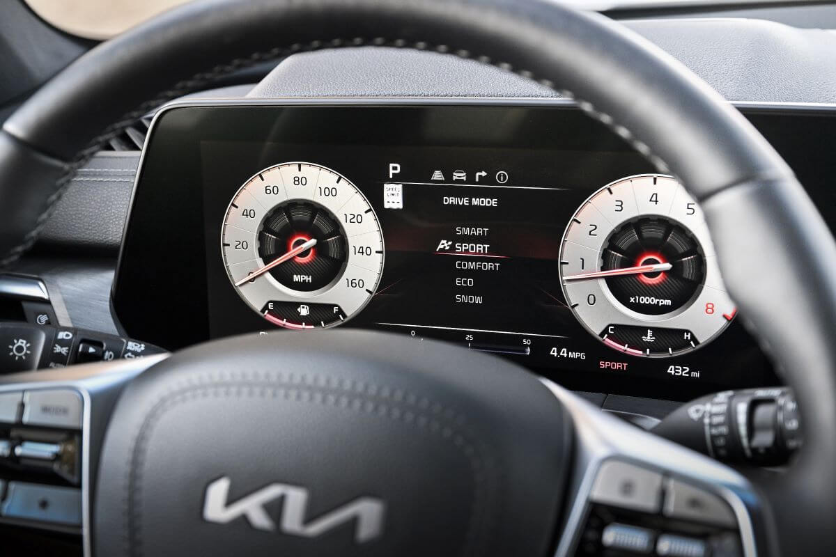 The driver's display of the 2023 Kia Telluride which presents menus and ADAS safety feature information