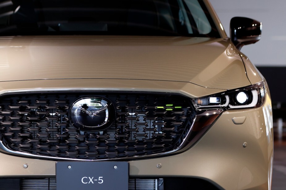 A light brown Mazda CX-5. 