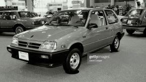 Pontiac Firefly parked indoors.