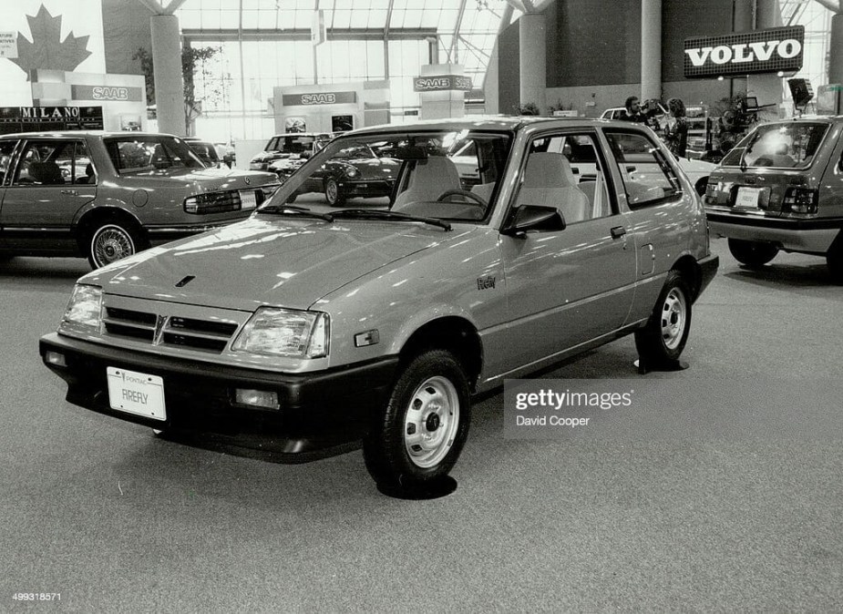 Pontiac Firefly parked indoors.