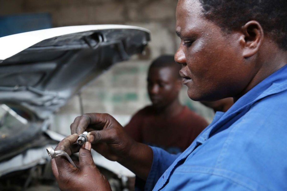 A person possibly performing recall repairs for free. 