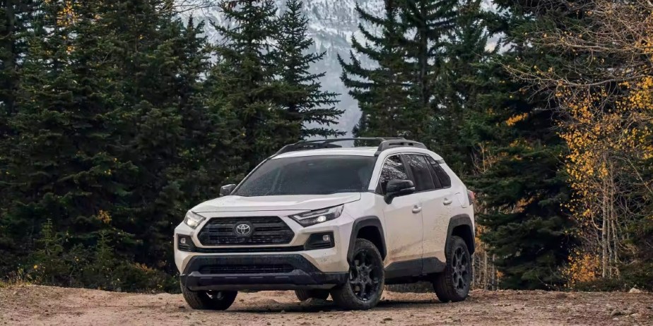 A white 2023 Toyota RAV4 small SUV is parked outdoors. 