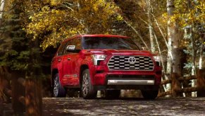 A red 2023 Toyota Sequoia full-size SUV is parked.