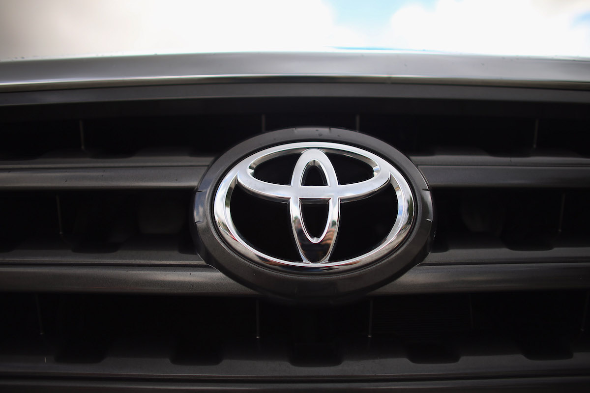 A Toyota logo, maker of the Toyota Tundra.