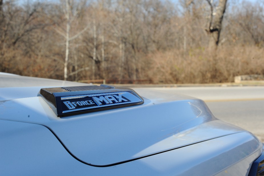 The hood of the Toyota Tundra, showing the i-FORCE MAX hybrid engine badge.