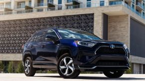 A 2023 Toyota RAV4 Prime parked on display.