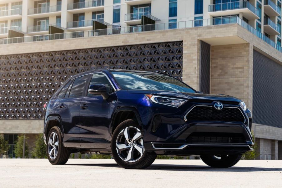 A 2023 Toyota RAV4 Prime parked on display.