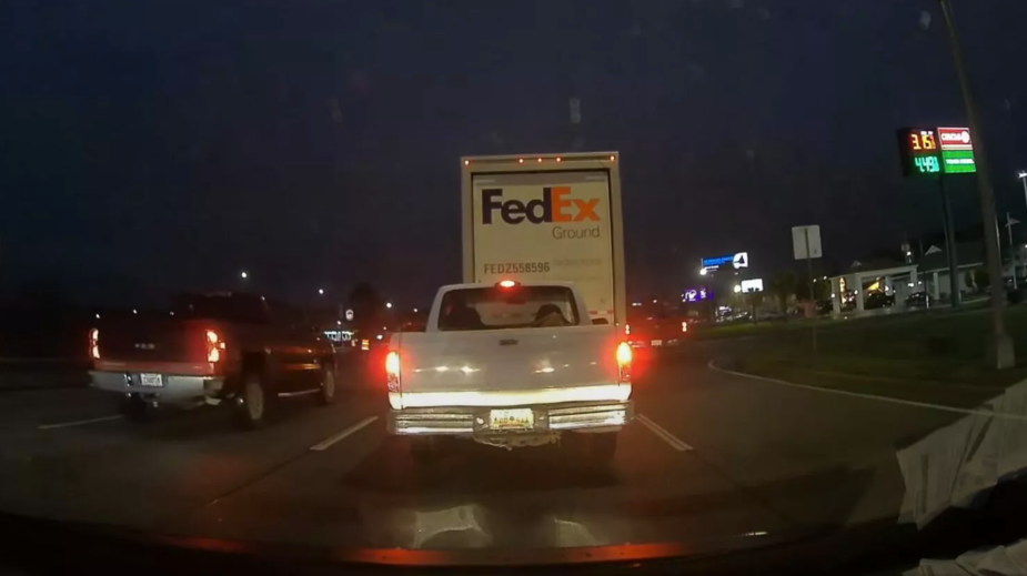 A white truck following a FedEx truck before hitting it. Waze app seemed to predict the crash. 