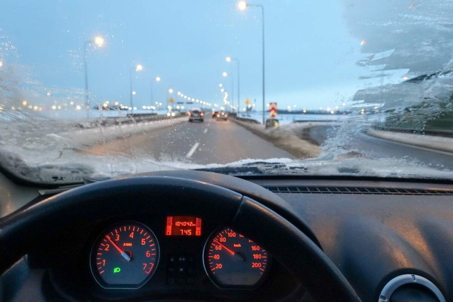 A window defroster at work on a ice covered window. 