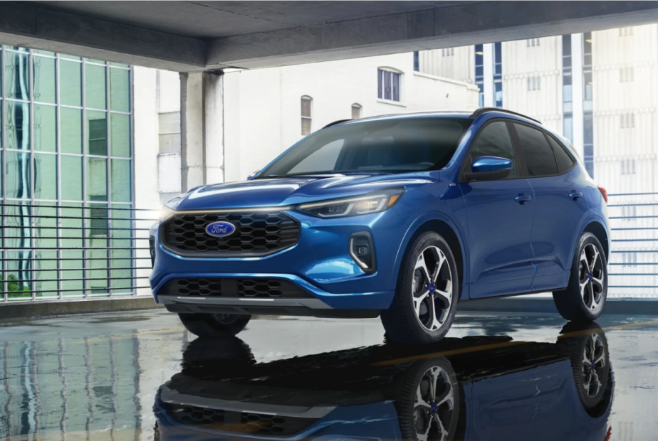 A blue 2023 Ford Escape ST-Line Elite compact SUV model in a parking garage