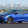 A blue 2016 Honda Civic Coupe