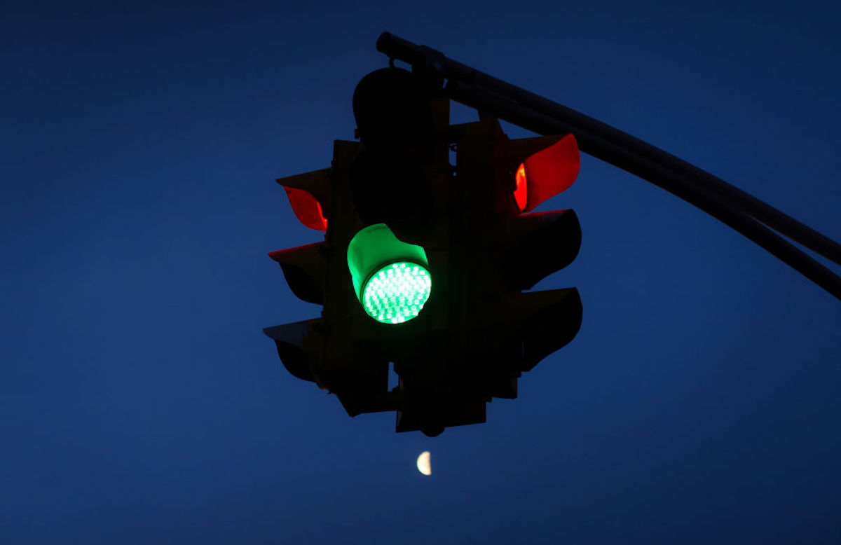 Traffic light at sunrise.