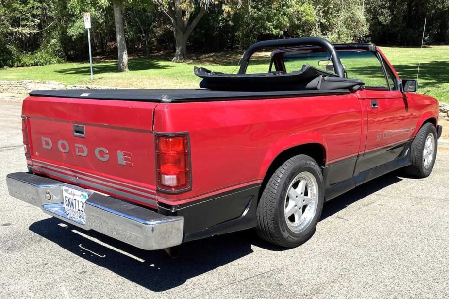 The bed and tailgate of a Dodge Dakota Sport convertible pickup truck with its soft-top down.