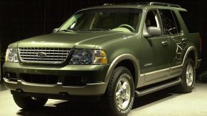 A 2002 Ford Explorer on display at an auto show.