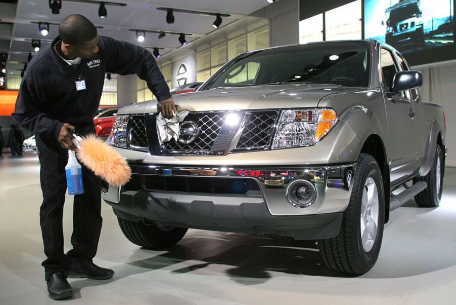 A 2005 Nissan Frontier on display at an auto show. The 2005 model is one of the worst Nissan Frontier models.