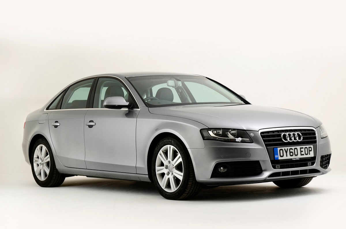 A 2011 Audi A4 used luxury car shows off its reliable, subtle lines and silver paintwork while it poses for a photo shoot.