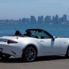 A white 2023 Mazda MX-5 Miata shows off its non-RF convertible top.