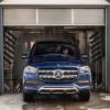 A blue 2020 Mercedes-Benz GLS 450 4MATIC full-size luxury SUV model exiting a car wash