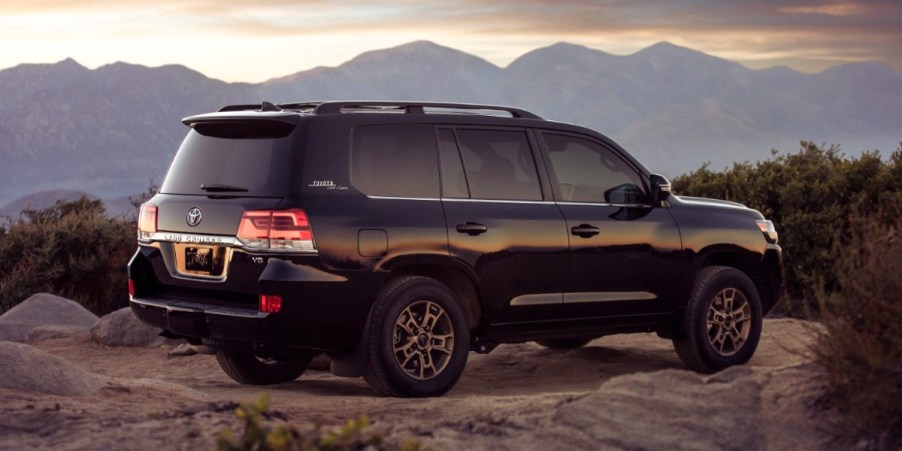 A black 2021 Toyota Land Cruiser is parked outdoors.