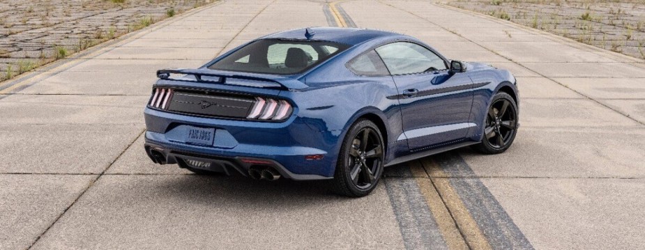 A blue 2023 Ford Mustang EcoBoost shows off its grand tourer styling and stealth package. 