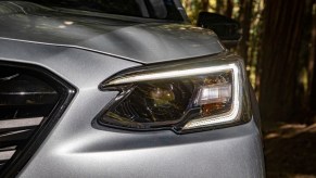 A silver 2022 Subaru Outback headlight. The 2022 Outback is one of the best Subaru vehicles.