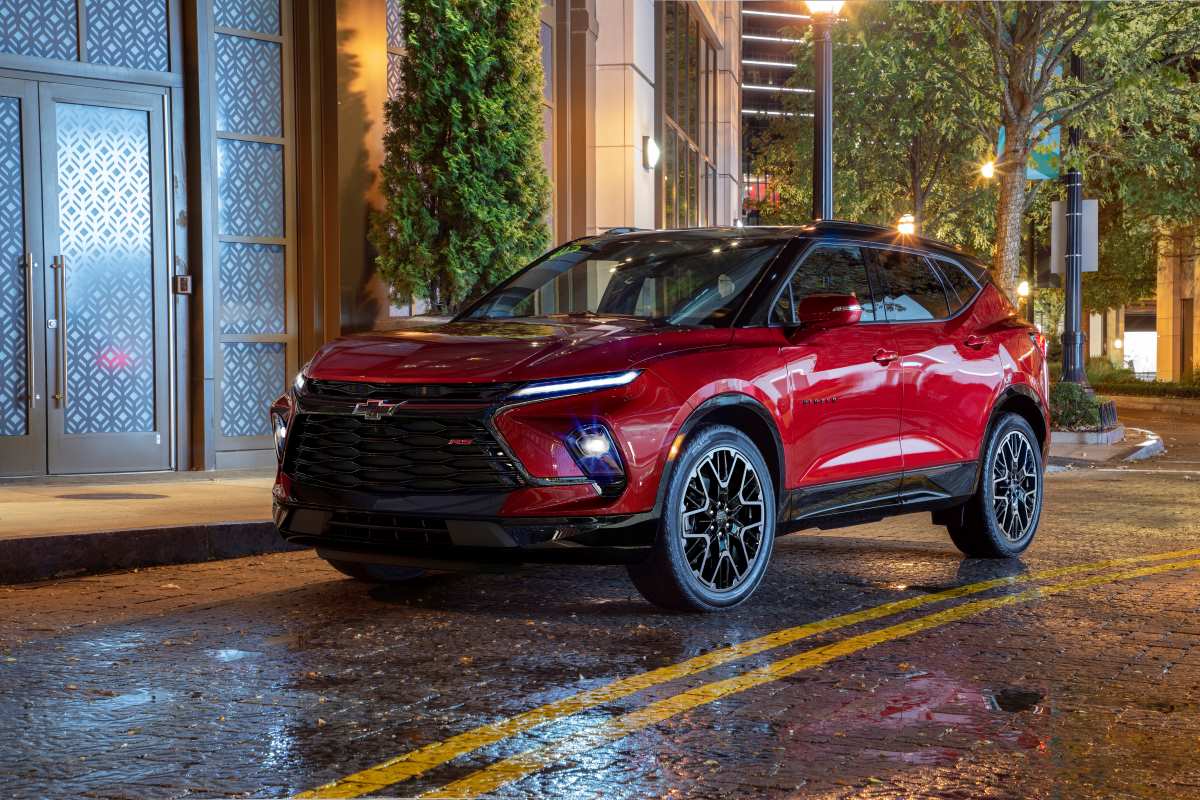 A red 2023 Chevrolet Blazer sits on a street 