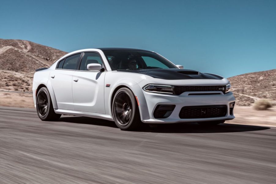 A 2023 Dodge Charger Scat Pack Widebody darts around a track