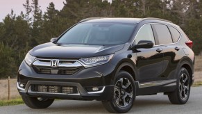 A black 2019 Honda CR-V small SUV is parked.