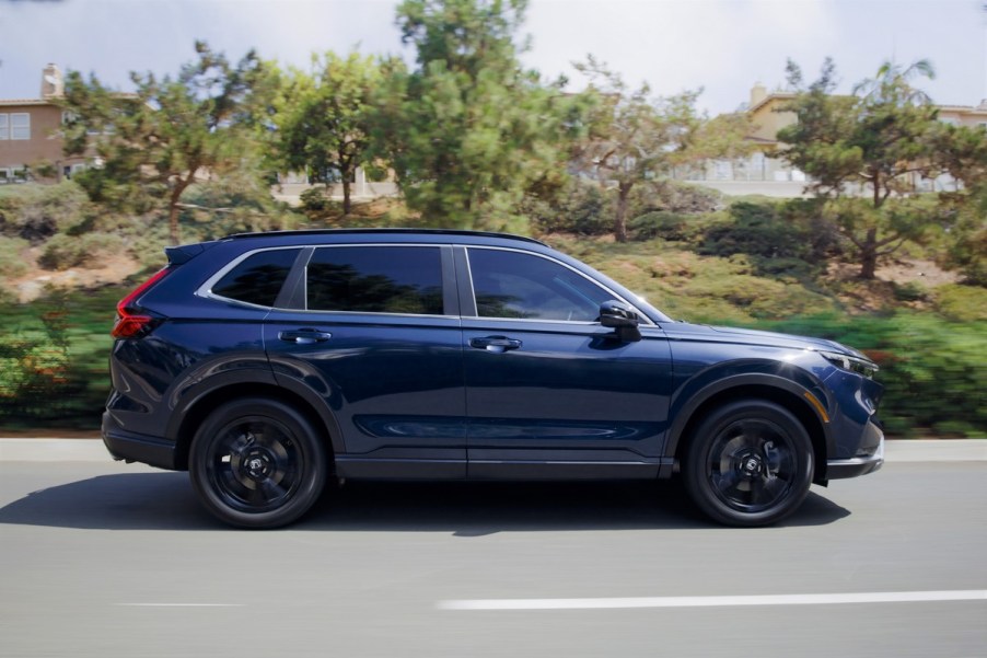 A 2023 Honda CR-V driving down a highway.