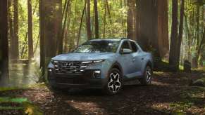 The 2023 Hyundai Santa Cruz off-roading in the woods